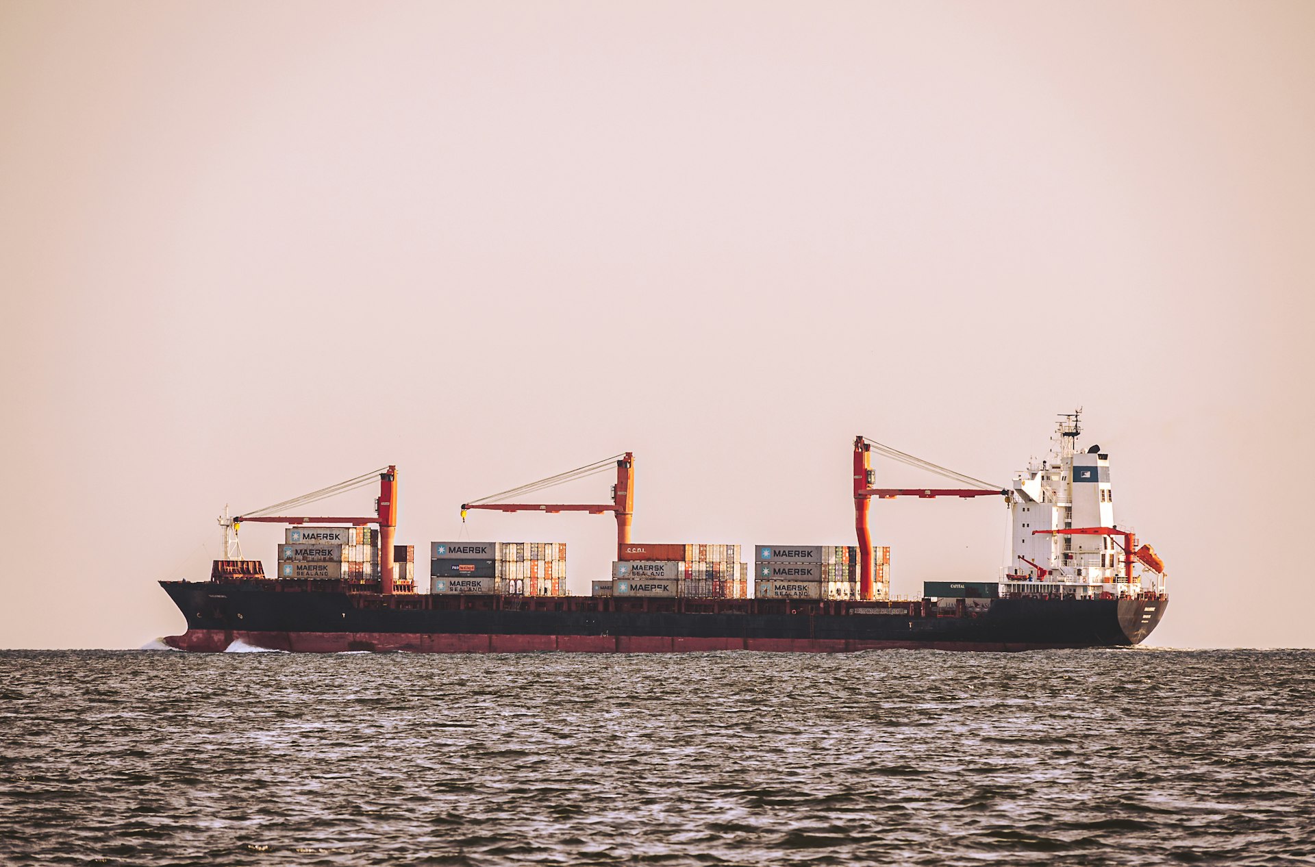 a large ship with cranes on it